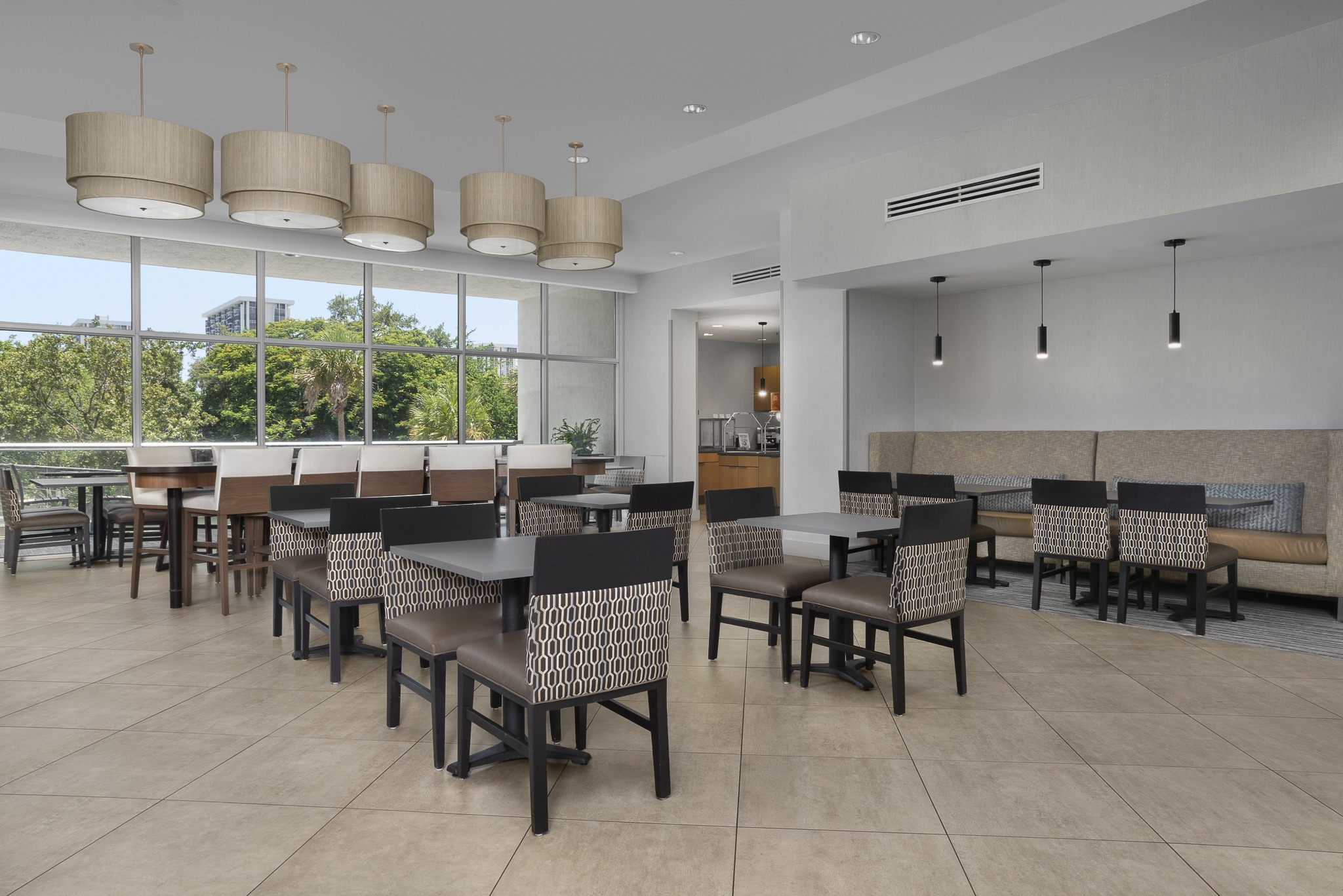 Modern hotel dining area with large windows