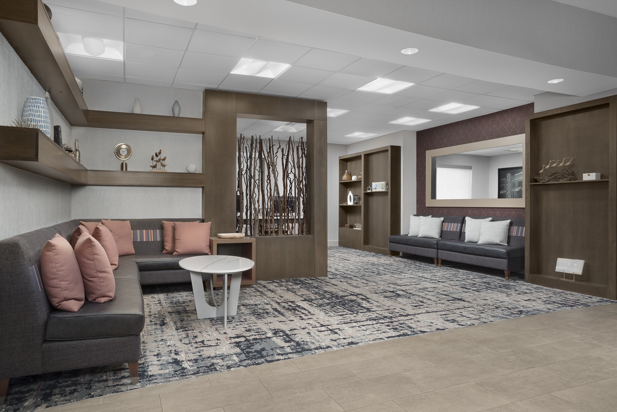 Modern hotel lobby with seating area.